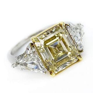 GIA Certified 4.29 Carat Emerald Cut Fancy Yellow Diamond, 1.81 Carat TW Trillion Cut White Diamond, Platinum and 18 Karat Ye