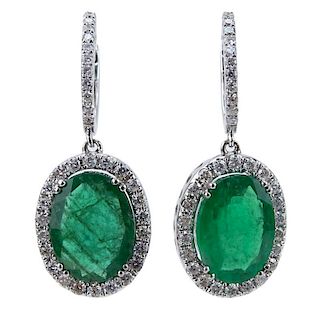 Approx. 5.45 Carat Oval Cut Emerald, 1.15 Carat Diamond and 18 Karat White Gold Pendant Earrings.