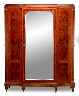 AN EARLY 20TH CENTURY FRENCH TRIPLE ARMOIRE