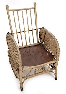 A 19TH CENTURY CHILD'S WICKER MORRIS CHAIR