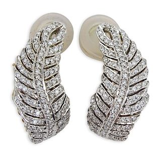 Pair of Micro Pave Set Round Brilliant Cut Diamond and 14 Karat Yellow Gold Leaf earrings.