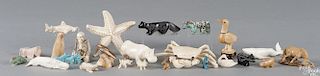 Collection of carved ivory and stone animals