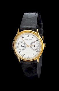 An 18 Karat Yellow Gold Ref. C20447 Day/Date Calendar Wristwatch, Audemars Piguet, Circa 1990,