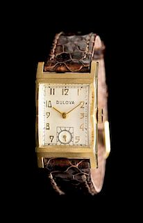 A 14 Karat Yellow Gold Wristwatch, Bulova,