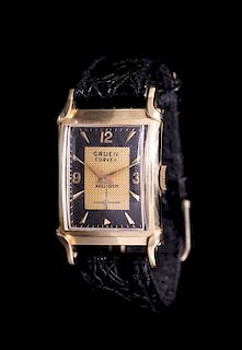 A 14 Karat Yellow Gold Curvex Precision Wristwatch, Gruen, Circa 1944,