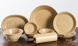 Eight yellowware plates and bowls