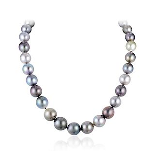 A Single Strand Necklace of Fine Semi-Baroque Black Pearls