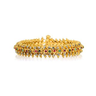 An Indian High Karat Gold and Gemstone Bracelet