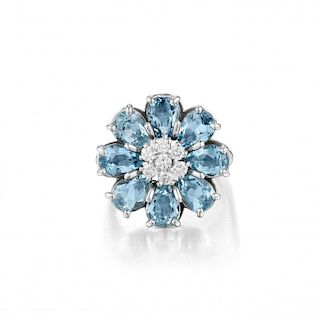 An Aquamarine and Diamond Flower Ring