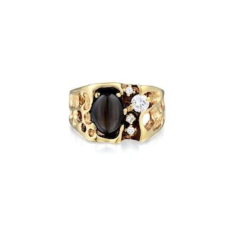 A Black Star Sapphire and Diamond Gents Ring