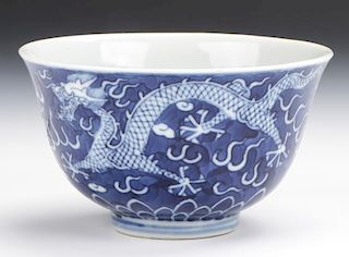 Chinese Porcelain Cup with Blue and White Dragon Design