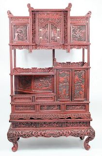 A Chinese Cinnabar Lacquer Display Cabinet