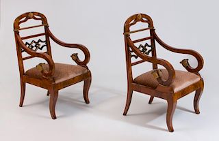 PAIR OF BALTIC NEOCLASSICAL STYLE MAHOGANY, EBONIZED AND PARCEL-GILT ARMCHAIRS