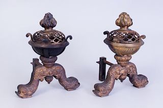 PAIR OF BAROQUE STYLE PATINATED BRONZE AND GILT-METAL ANDIRONS WITH FLAME FINIALS AND DOLPHIN SUPPORTS