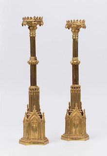 PAIR OF GOTHIC STYLE BRASS CANDLESTICKS