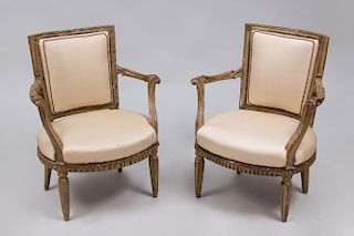 PAIR OF ITALIAN NEOCLASSICAL PAINTED AND PARCEL-GILT ARMCHAIRS