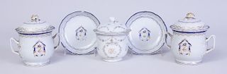 PAIR OF CHINESE EXPORT ARMORIAL PORCELAIN CUPS AND COVERS, AND TWO MATCHING SAUCERS