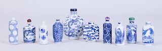 TEN CHINESE BLUE AND WHITE PORCELAIN SNUFF BOTTLES AND A CINNABAR STYLE SNUFF BOTTLE
