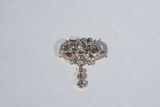 Platinum and diamond pendant, center diamond approximately 1 ct., largest diamond approximately .75 cts., approximately 3 cts
