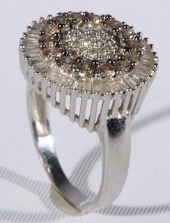 Ladies 10 karat white gold circular diamond cluster ring consisting of outer row of diamond baguettes totalling thirty-eight