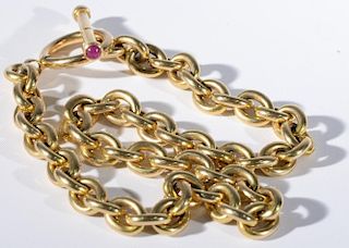 14 karat gold necklace with large links and T end mounted with pink stones. 17 1.4in., 64.6 grams