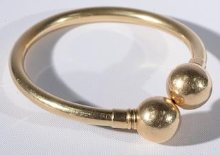 14 karat gold bracelet with large round ends