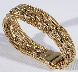 Tiffany & Co. 14 karat gold mesh bracelet having four mesh bands. lg. 6 3/4in., 34.4 grams