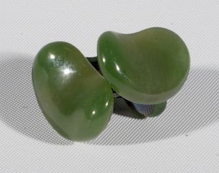 Pair of Tiffany & Co. Elsa Peretti jade "Bean" sterling cufflinks.