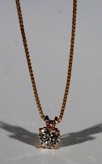 14 karat yellow gold chain and pendant mounted with heart shaped brilliant cut diamond, F-G Color