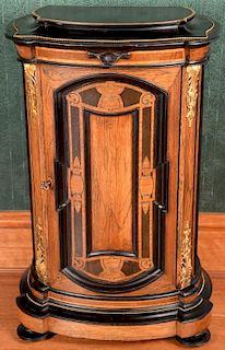Renaissance Revival rosewood and ebonized cabinet with gilt metal mounts and birdseye maple interior. ht. 35in., top: 12" x 2