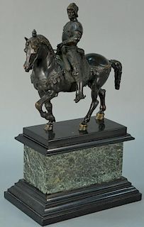 Bronze knight on horseback set on slate and granite base (part of reins is missing). ht. 21 1/2in., wd. 13in.
