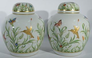 Pair of Tiffany Jardin Private Stock hand painted covered jars, each having hand painted leaves and colorful butterflies and