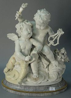 Victorian figure of two putti on gray marble base (repairs). ht. 22 1/2in., wd. 18in. Provenance: Property from the Estate of