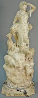 Alabaster figure of a woman and four goats on marble base, marked St