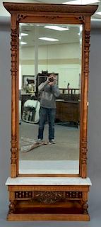Victorian walnut pier mirror with marble shelf. ht. 97 1/2in., wd. 42in. Provenance: Property from the Estate of Frank Perrot