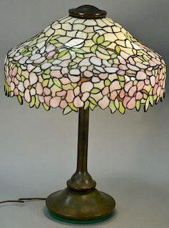 Attributed to Handel, leaded glass table lamp on bronze base, dogwood pattern with pink and white flowers, and yellow and gre