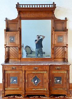 Aesthetic movement walnut sideboard in multiple parts, upper portion with large gallery top over central mirror flanked by tw