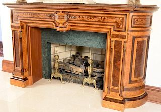Aesthetic movement fireplace mantle, birdseye maple, rosewood, and burl walnut with center urn and Greek key inlay flanked by