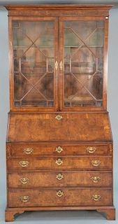 George IV burlwood secretary desk in two parts, upper portion with two glazed doors over slant lid over four drawers on brack
