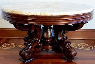 Rosewood Victorian center table having unusual honey onyx top on base with center and four outside supports joined all set on
