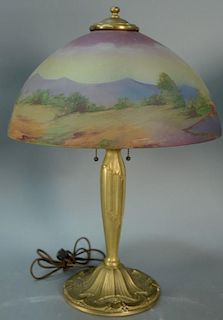 Reverse painted table lamp, scenic with sailboat on metal base. ht. 22in., dia. 16in. Provenance: Property from the Estate of