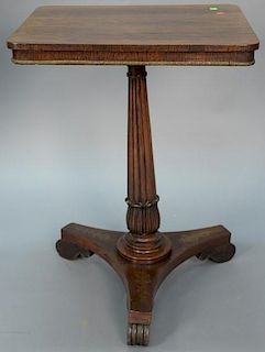 Rosewood stand having rectangular top with bronze edging on fluted shaft on base with brass inlays, set on scrolled feet, 19t
