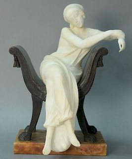 Marble sculpture of reclining woman in bronze chair on marble base. ht. 18in., wd. 14in. Provenance: Property from the Estate