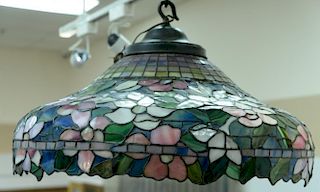 Large leaded stained glass hanging lamp, bell form shade with colorful flower and leaf design and four sockets, possibly Duff