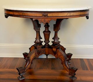 Victorian walnut and burl walnut oval marble top table. ht. 31in., top: 27" x 37" Provenance: Property from the Estate of Fra