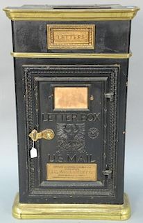 Metal U.S. Mail letter box with gilt trim and iron door. ht. 37in., wd. 21 1/4in., dp. 11 1/4in. Provenance: Property from th