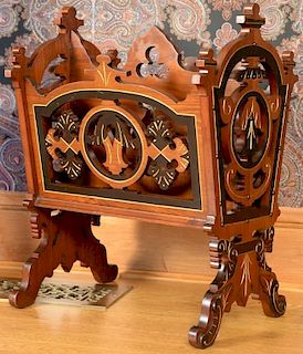 Renaissance revival magazine stand, pierce carved with incised gold and ebonized decoration on scrolled feet. ht. 28in., lg.