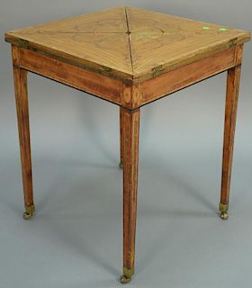 George III satinwood inlaid card table with four cornered revolving and opening top on inlaid square tapered legs with brass
