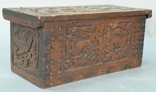 Continental walnut lift top box with carved panels and dovetailed corners and snipe hinges, 18th - 19th century. ht. 5in., wd
