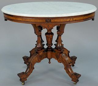 Victorian walnut and burl walnut oval marble top table. ht. 30in., top: 28" x 38" Provenance: Property from the Estate of Fra
